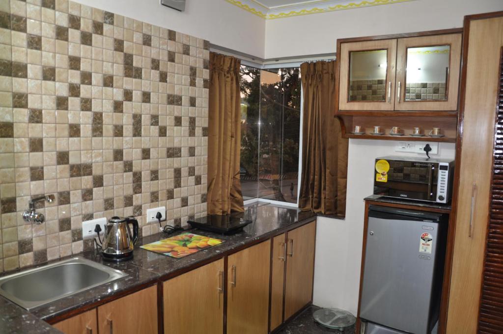 Astoria Residency Hotel Ooty Ruang foto